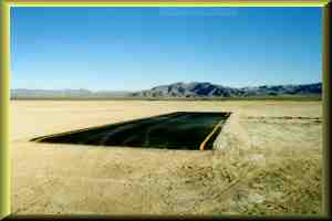 The beginning and the end of the Road to Nowhere.  Center of lake looking West